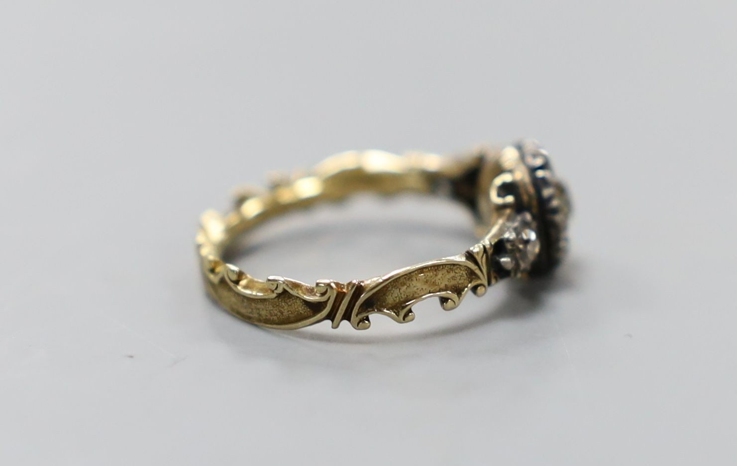 A late 18th century gold and old cut diamond set circular cluster ring